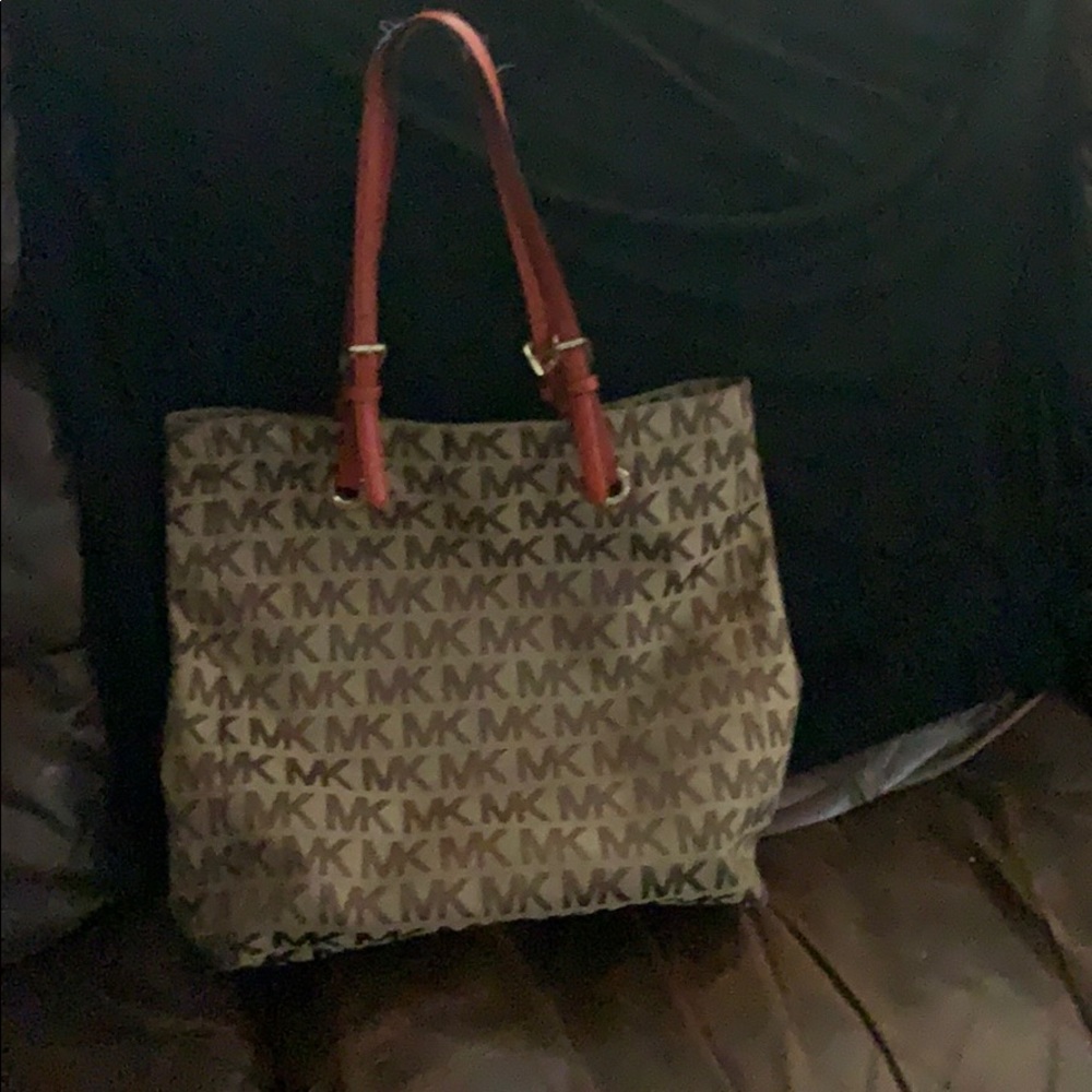 Tan Michael Kors logo orange handles tote bag used
